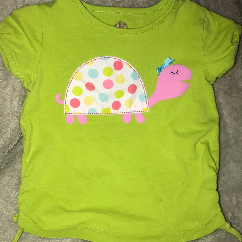 Really cute girls top with drawstring sides